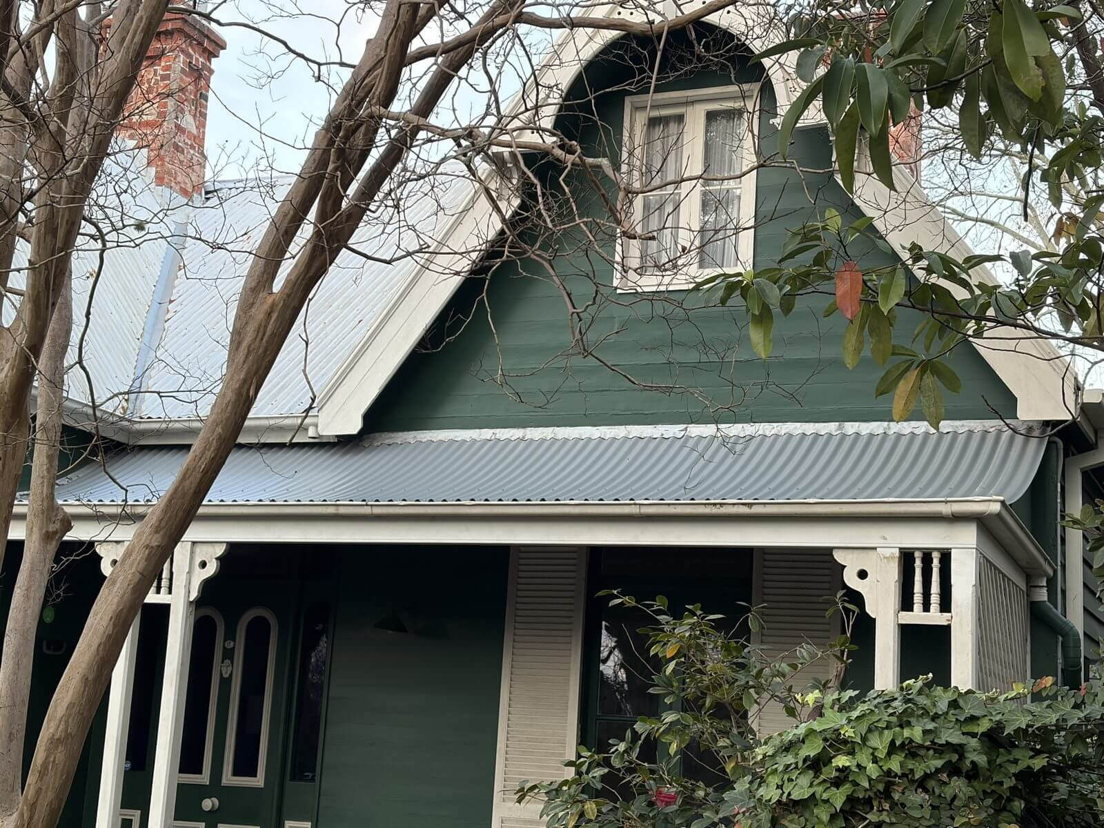 Heritage cottage with a corrugated bullnose verandah roof